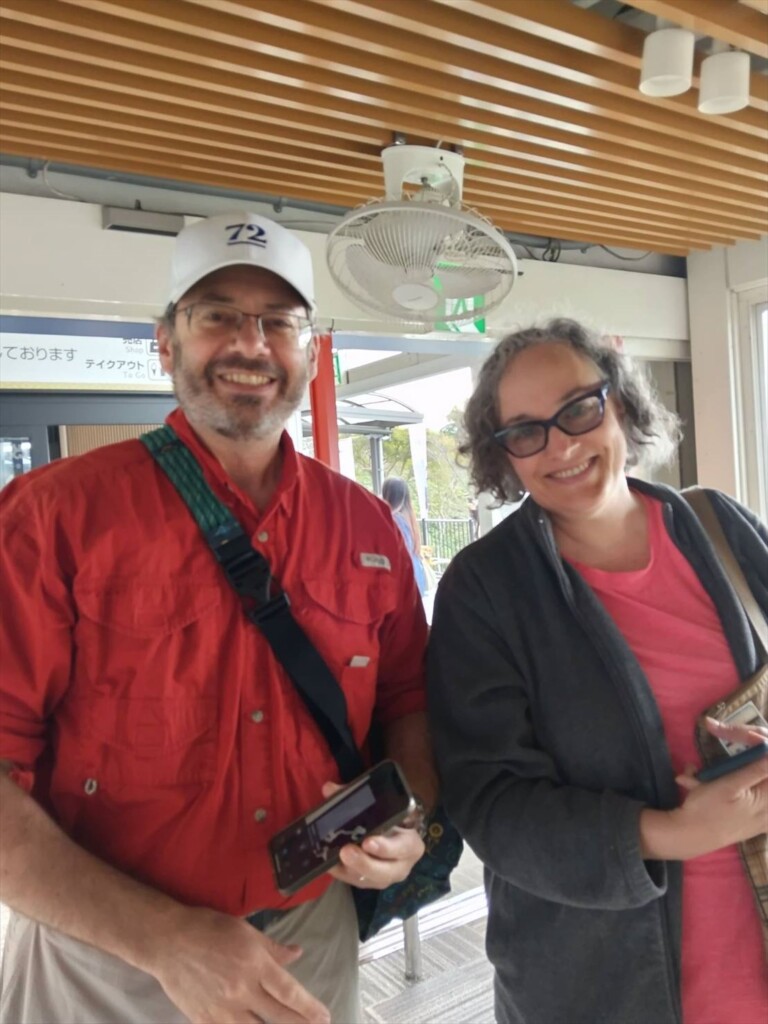 Couple on a shore excursion from Shimizu Port, standing near the ropeway station to Kunozan Toshogu Shrine, Shizuoka, Japan.

