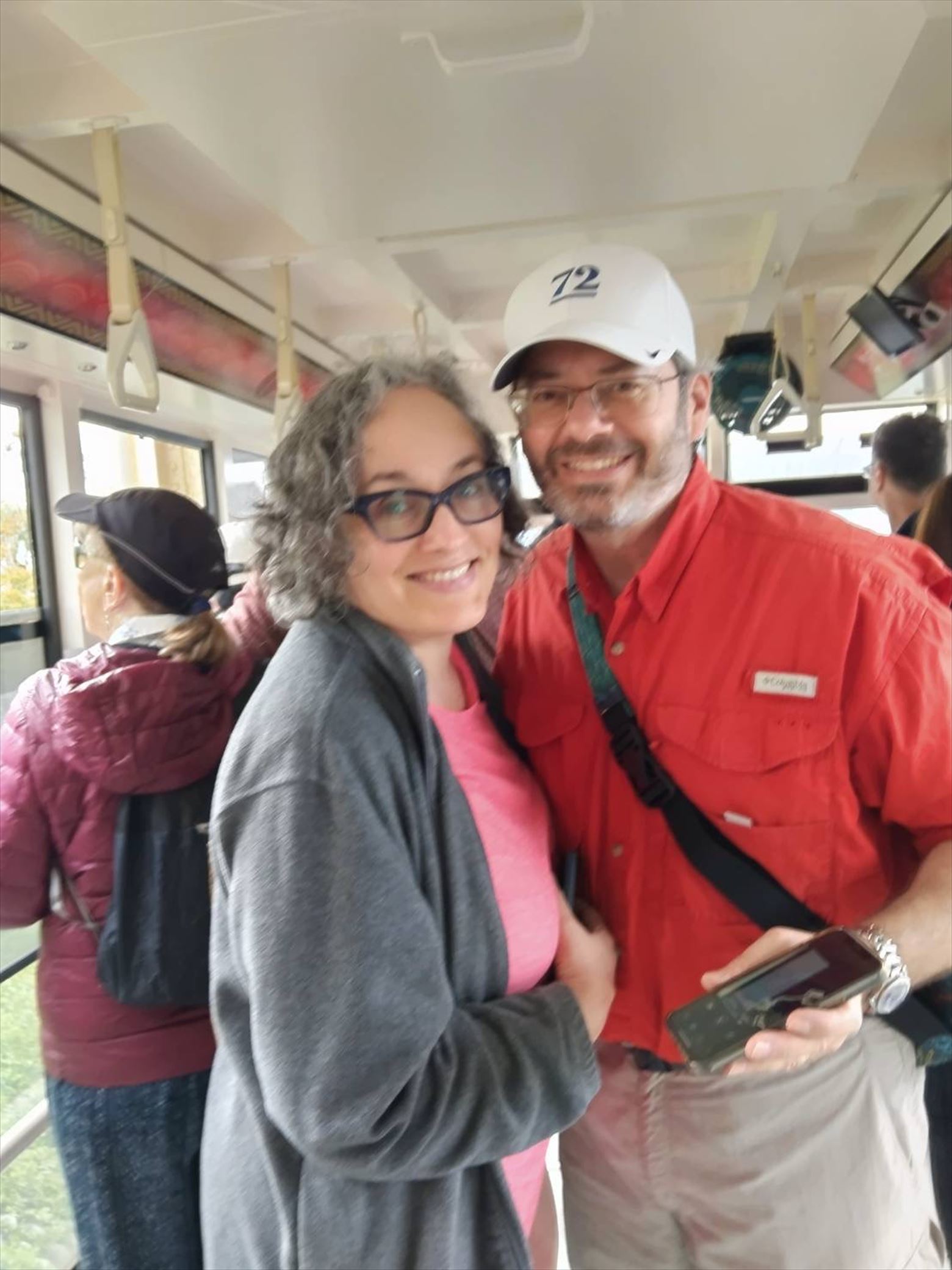Two tourists with big smiles, satisfied with the tour