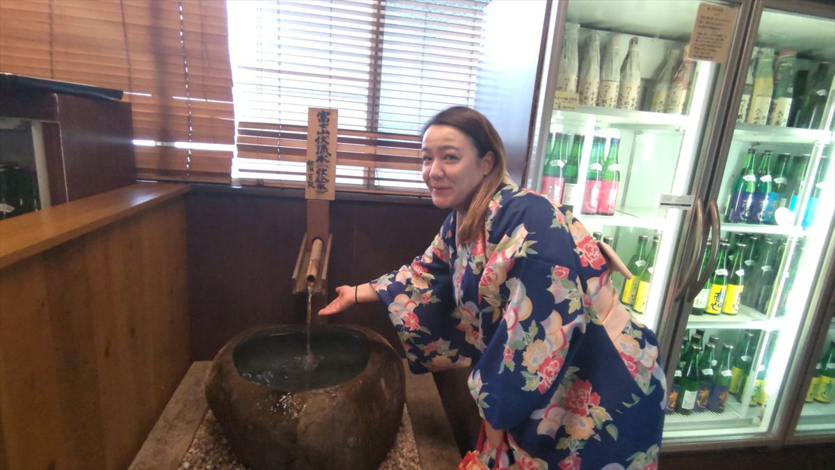 Spring water from Mt. Fuji flowing inside the brewery, available for visitors to drink.