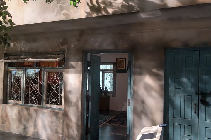 Full-scale model of a traditional international tea-drinking home, showing domestic interiors and tea culture together.