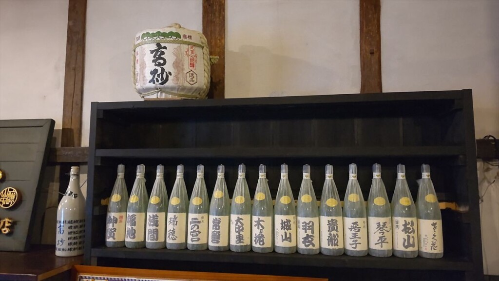 Bottles of sake displayed at the shop inside Takasago Brewery.